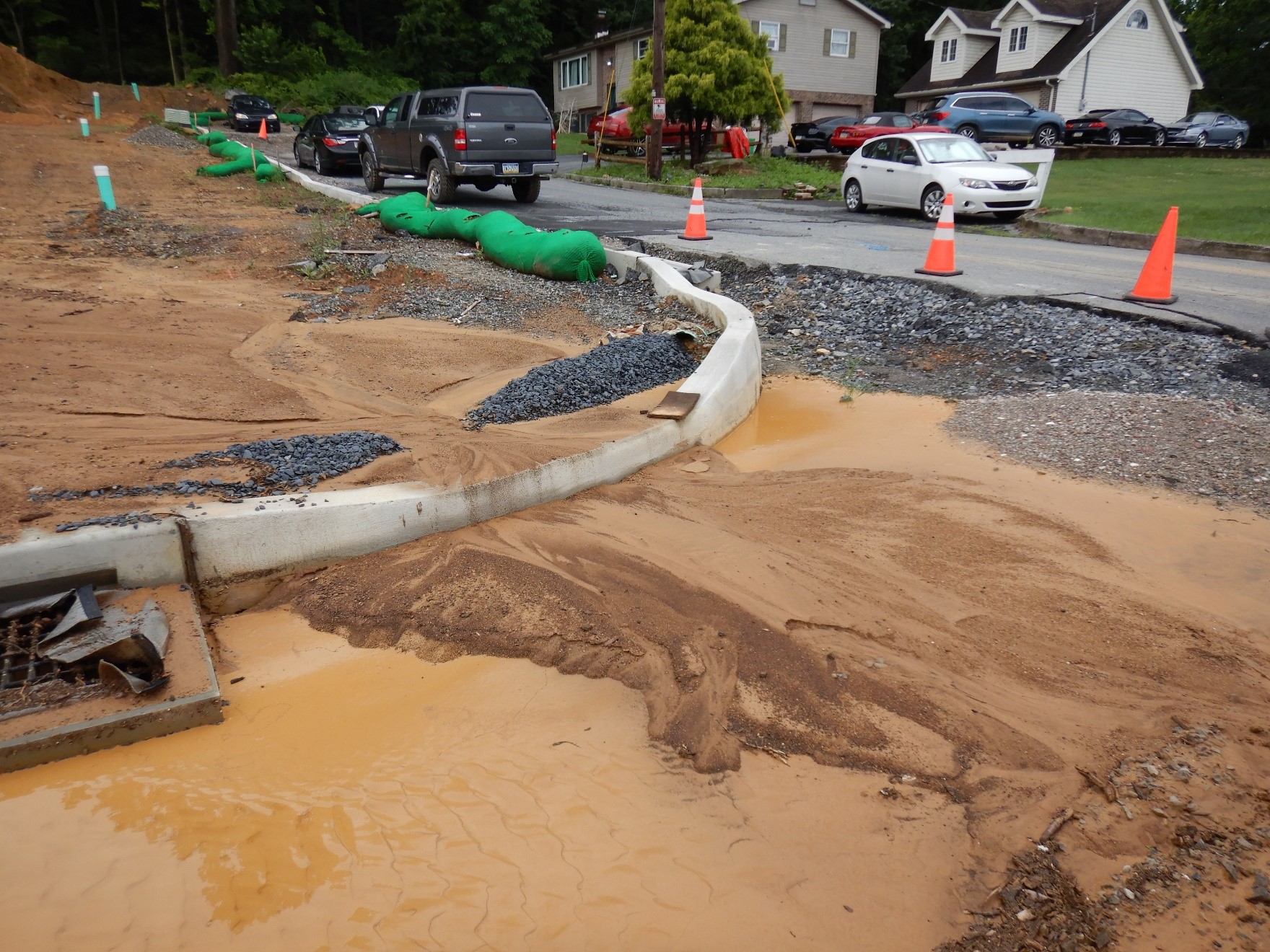 An outwash of dirt and construction debris after a major storm.